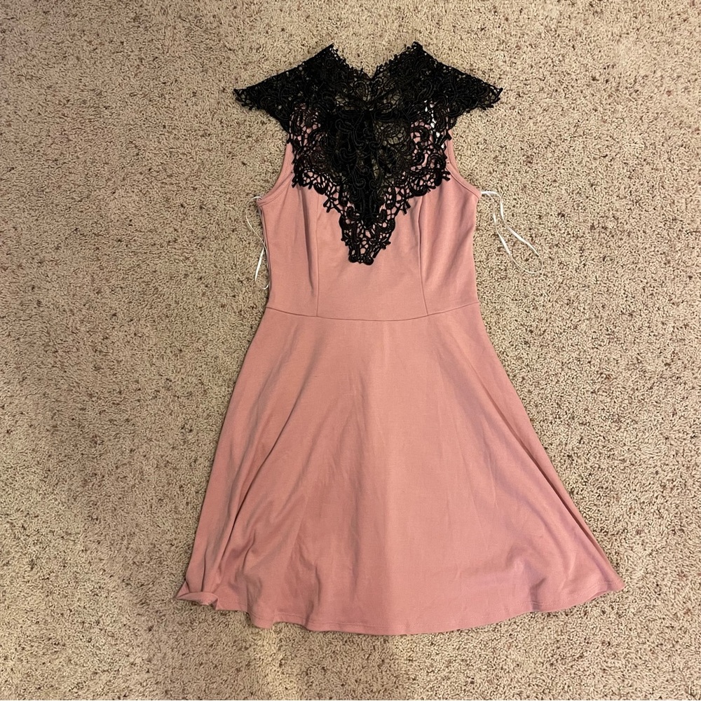 Excellent condition size S blush pink dress with intricate black lace detailing